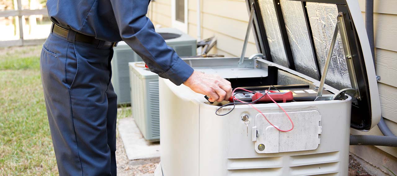 technician checking generator