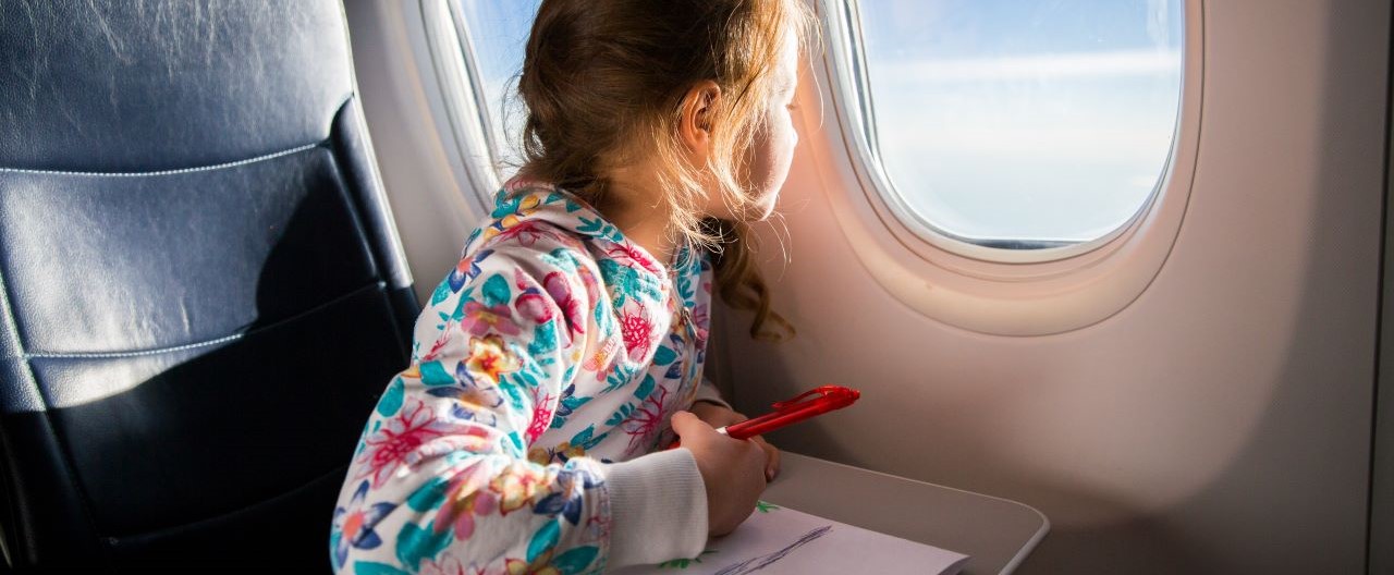 little girl on plane