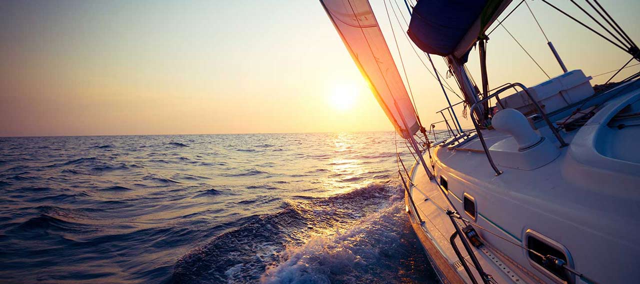 yacht sails into horizon